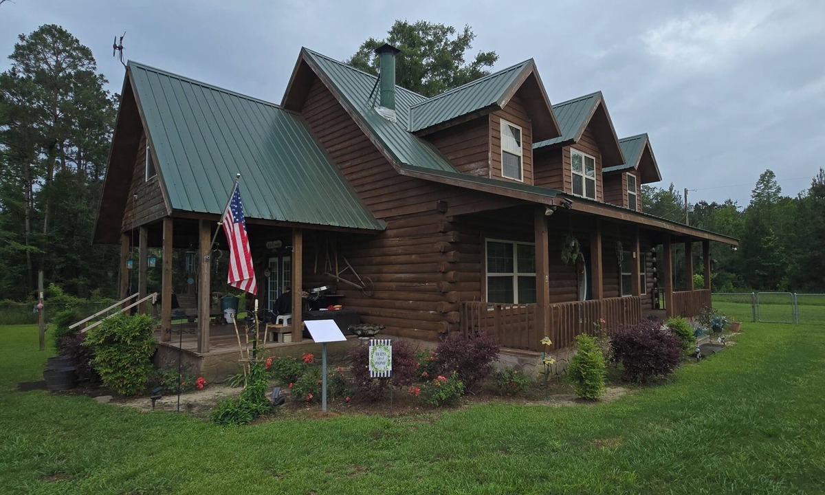 Pansey Cabin | 3-bedroom log cabin backs up to wooded lot for maximum peace and quiet!