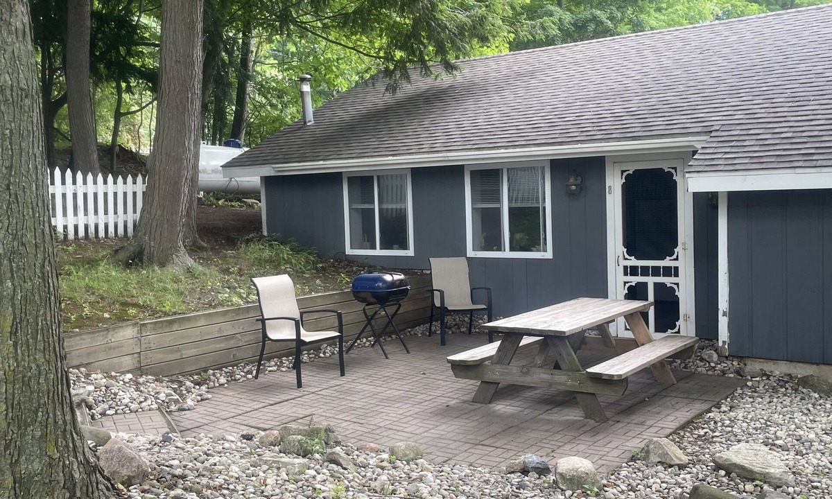 Ludington Cottage | #8 cottage comes with boat docks and shares over 600’ of frontage on Hamlin lake