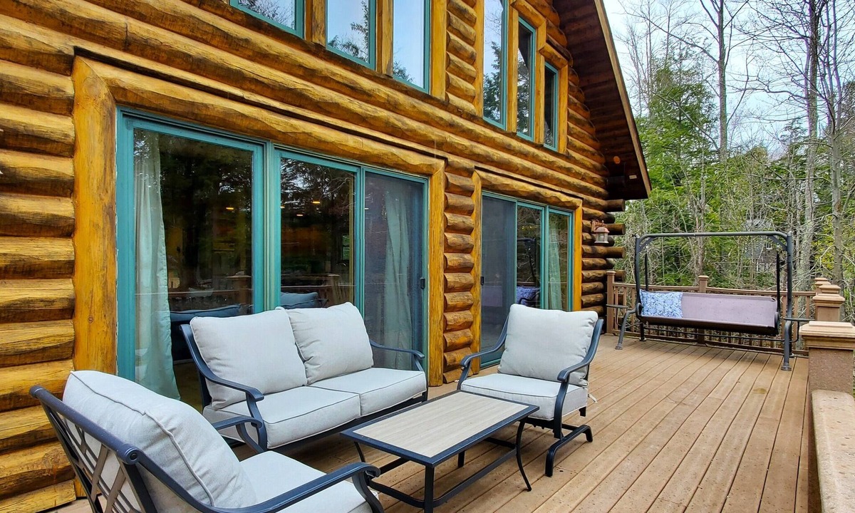Lake Township House | Arbor Lodge Lakehouse: Wooded Lodge with private beach access and dock on Big Platte Lake