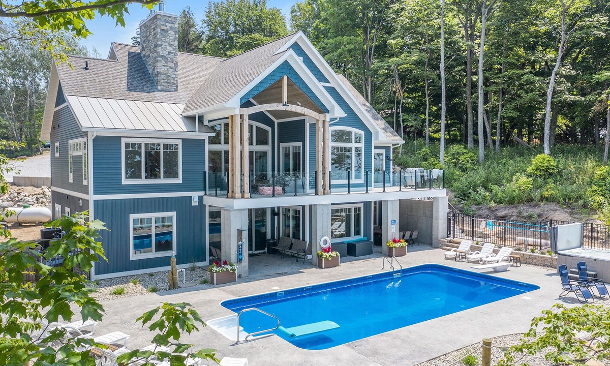 Ludington House | August 9th-16th, 2026 available! heated pool! Sleeps 20!