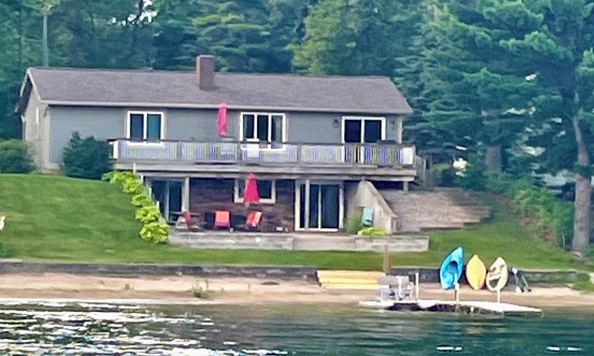 Twin Lake House | Charming 3-bedroom lake front property on Middle Lake. Private beach and dock.