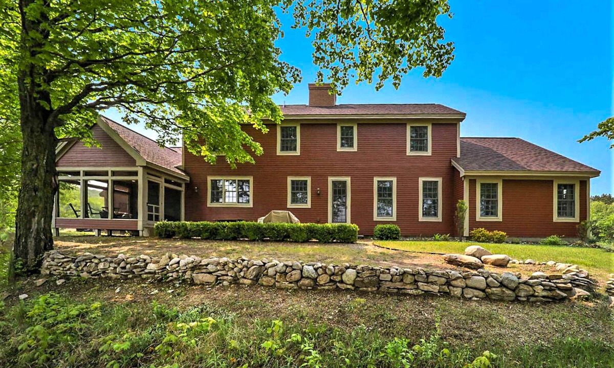 Maple City House | Exquisite Cape Cod home with large yard, fireplace, central AC, & W/D