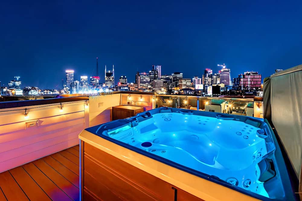Katie Hill Neighborhood House | Fall Nashville getaway: rooftop hot tub, bunk room, sleeps 12