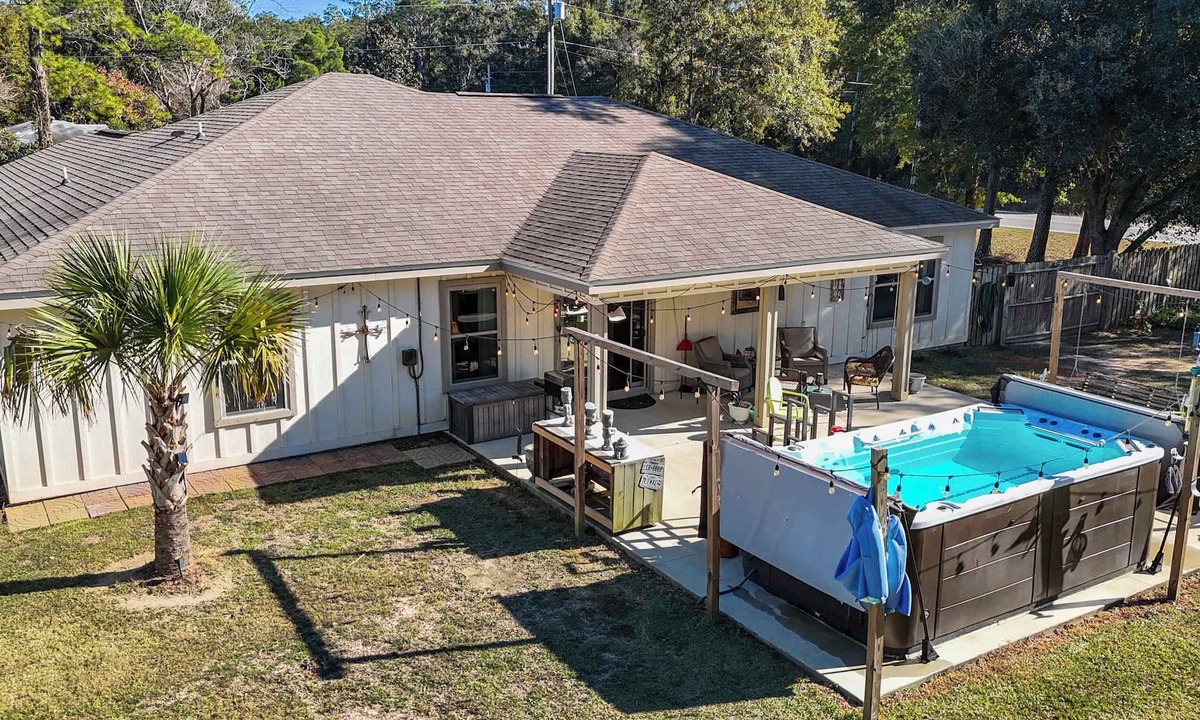 Foley House | Family Home with Swim Spa and Fenced Yard