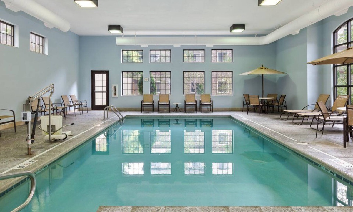 Kalamazoo Condo | Free Breakfast, Pool, Gym. Near Western Michigan University!