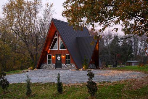 Idlewild House | Hot Tub, Fire Pit, On-Site Pond: Cozy Kenton Cabin