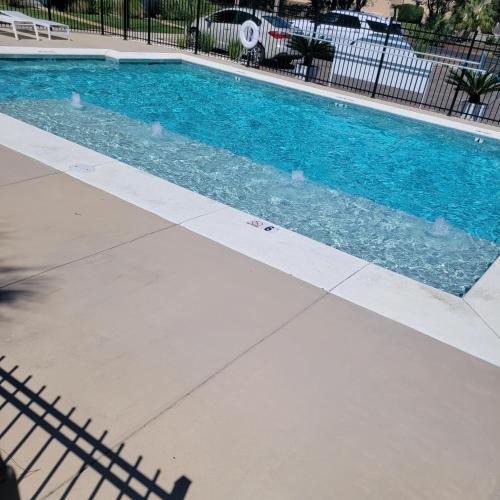 Gulf Shores House | Island Villa 10 by ALBVR - Super cute condo! Just steps to the Waterway District and minutes to the beach!