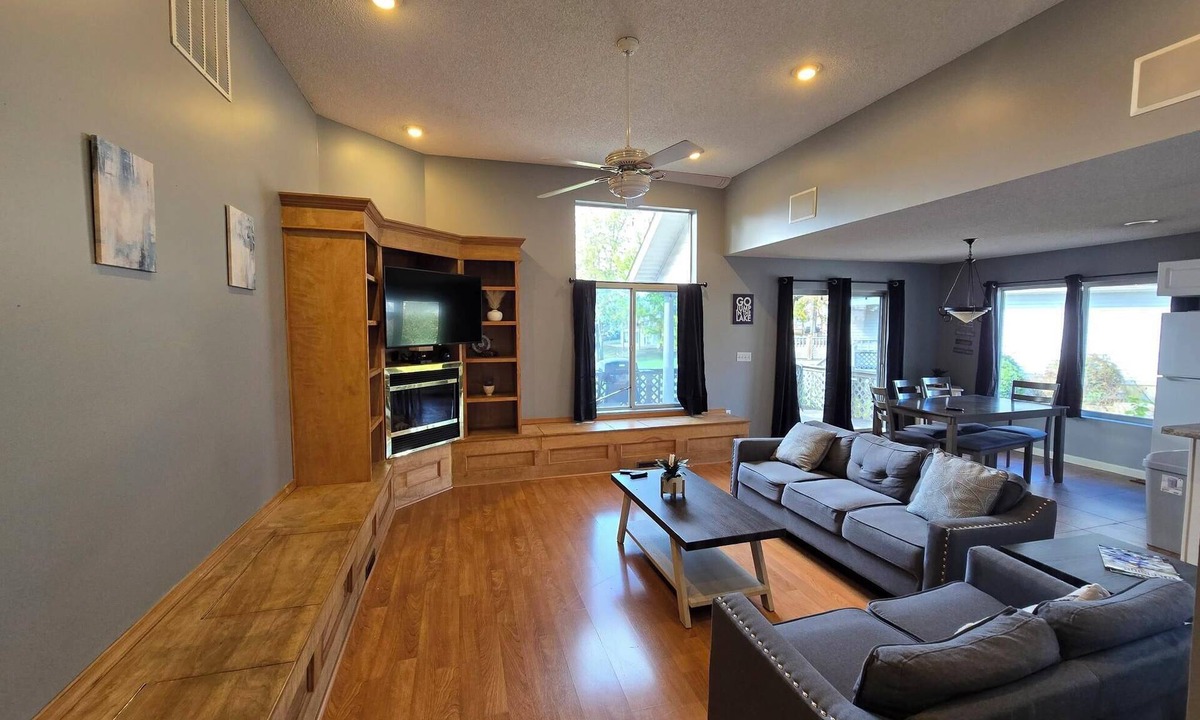 Marion House | Lake Front home Sleeps 10 Overlooking deck for perfect lake views & a coffee bar