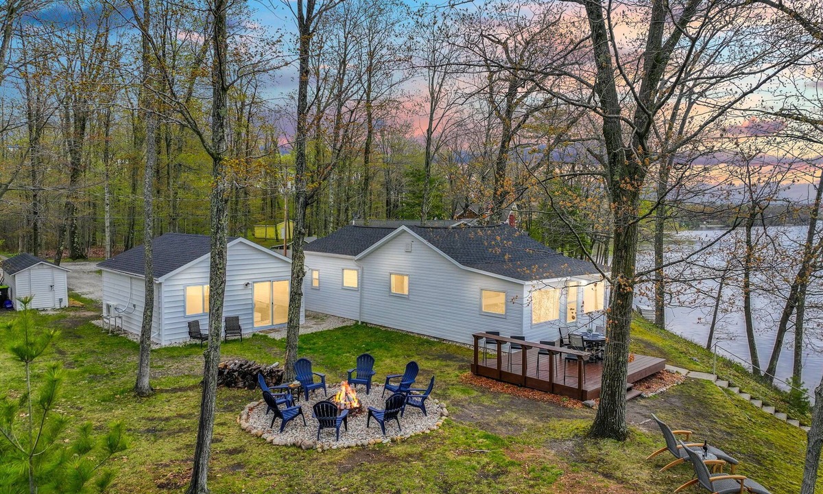 Carp Lake Cottage | Lakefront Cottage, Dock, EV Charger, Firepit, Bunkhouse, Family & Pet Friendly