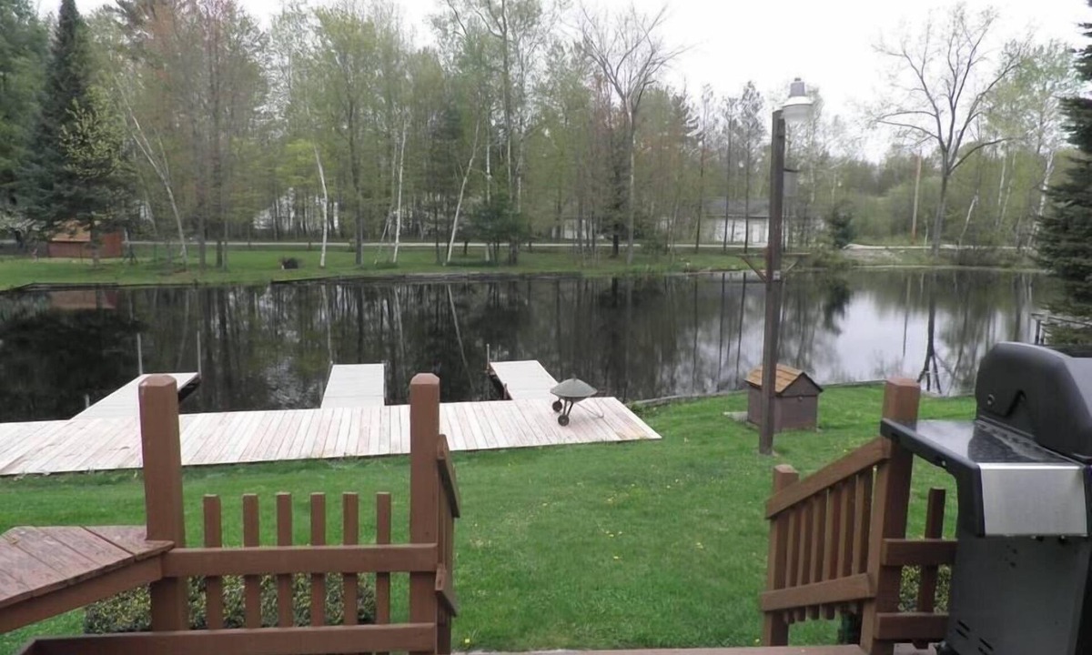 Cadillac House | Lazy Acorn "The Yellow Perch" on Lake Mitchell