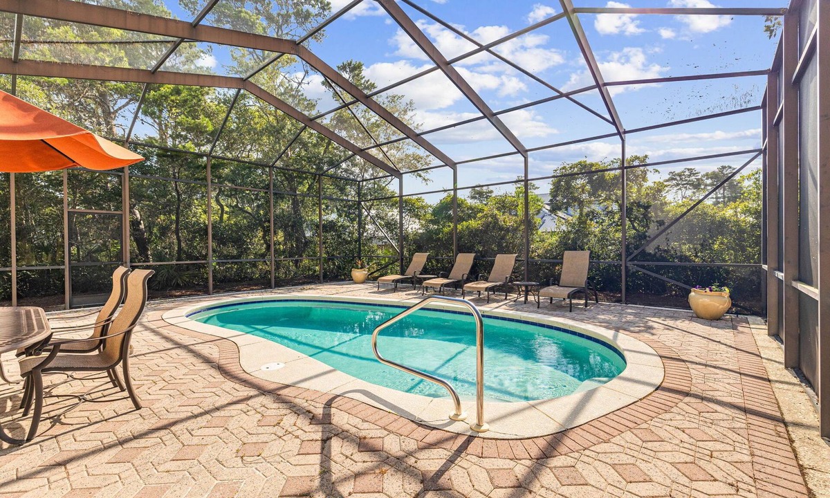 White's Gulfview House | Luxury retreat with screened pool, outdoor kitchen & dining, and coastal charm
