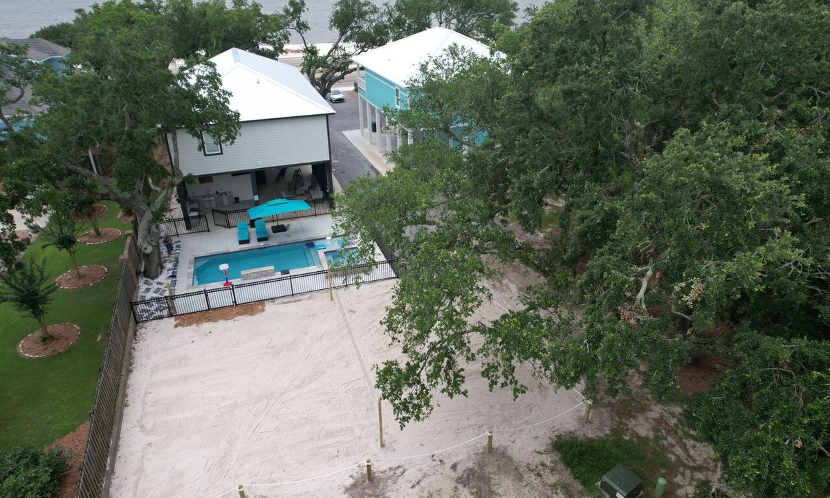 Long Beach House | New Beachfront home. Large Pool with Hot tub. Outside Kitchen. Volleyball court.