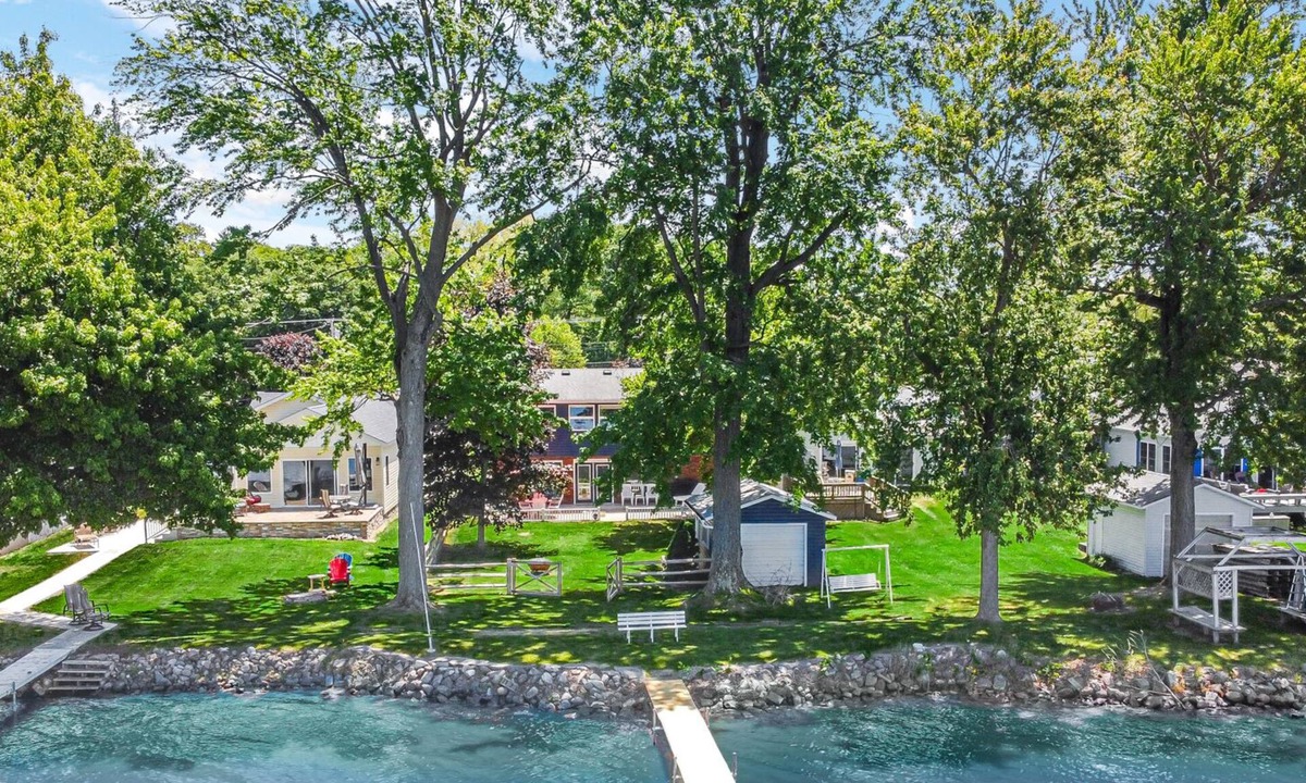 Bass Lake House | New! Sunset Shores: Lakefront home with private pier/huge fenced yard!