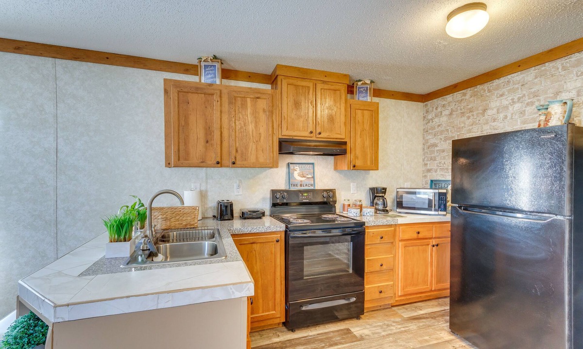 Bayou Grande Villa House | Pensacola Home w/Furnished Patio: 9 Mi to Beach!