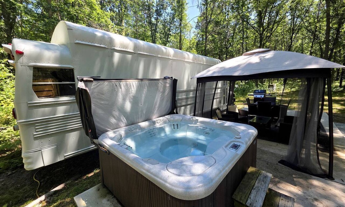 Bitely House | Rustic Converted School Bus with Outdoor Shower Near ORV Trails in Manistee National Forest, Michigan