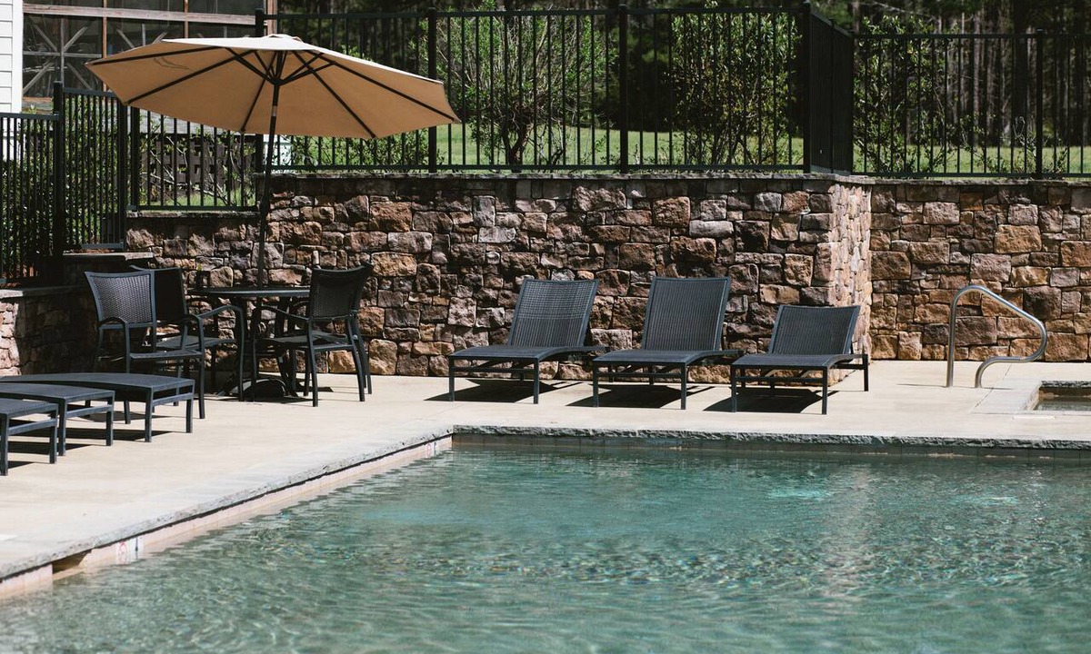Dadeville House | Spacious Lake Martin condo with screened porch, pool, marina access, and room for the whole family. Relax, reconnect, and enjoy the best of Lake Martin together! Perfect for families, boats, and golf.