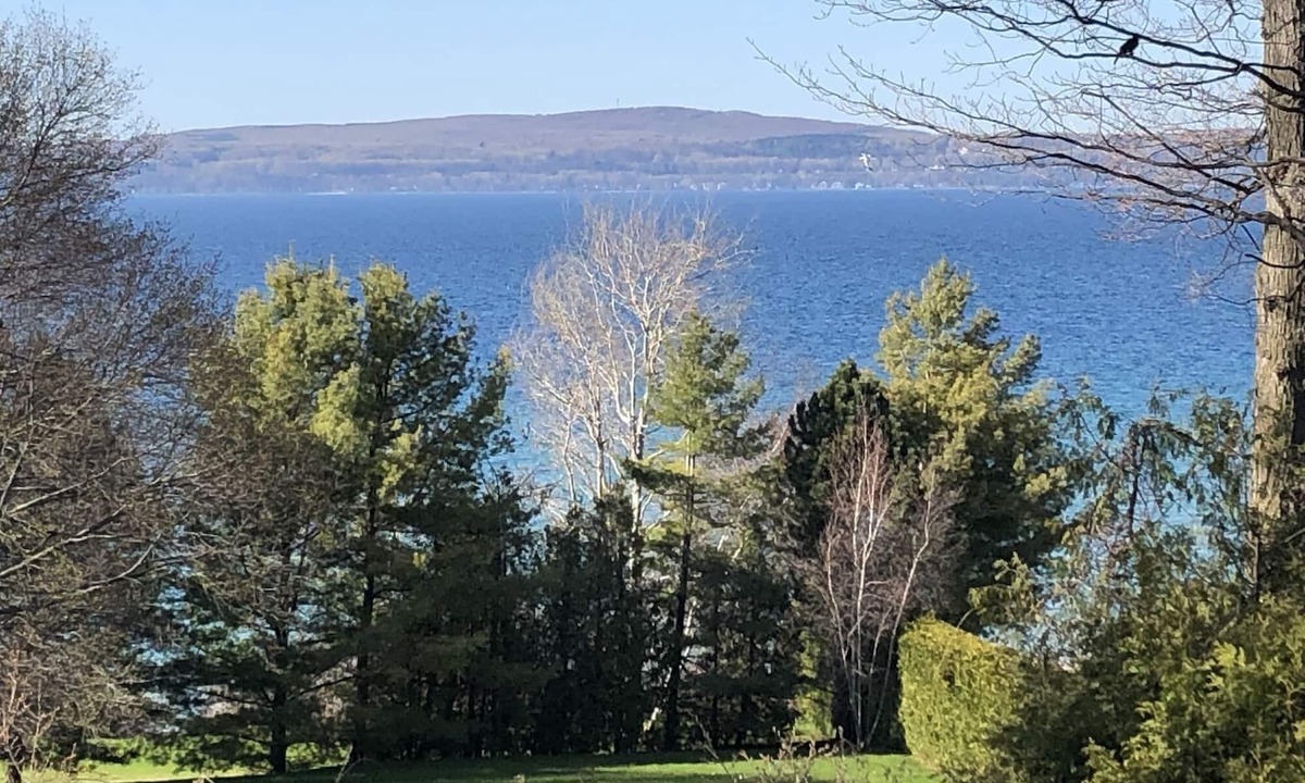 Petoskey Apartment | Water view Getaway, steps to Downtown Petoskey
