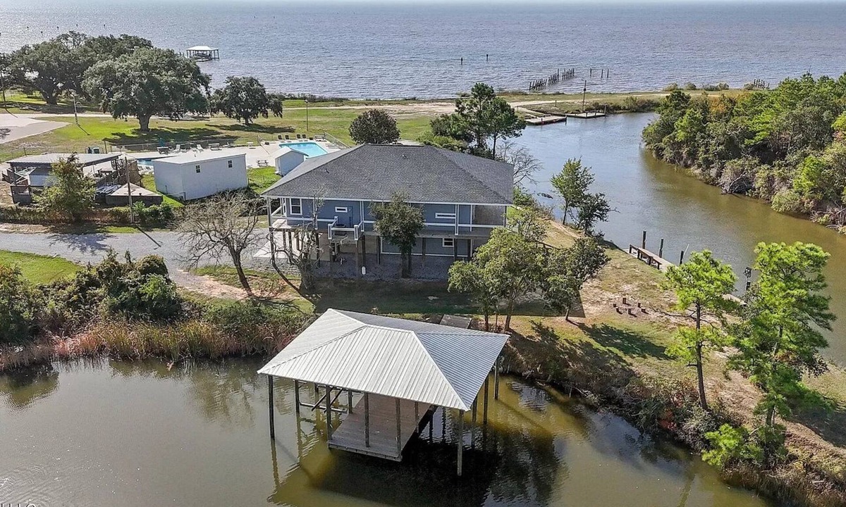 Kreole Cottage | Waterfront Home 3BD/4BA 2 Boat Docks Hot Tub Peaceful Retreat with Amazing Views