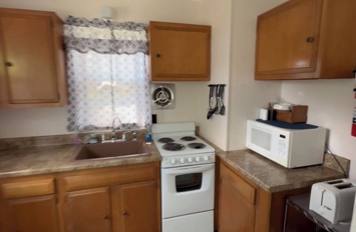 West Branch Cabin | 2-bedroom cabin with AC on a secluded cove of Lake Ogemaw.