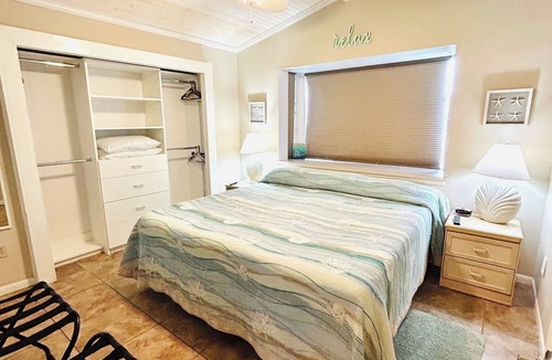 Lower Grand Lagoon Resort | 2 King Beds- 2 Golf Carts! 2 pools, playground, shuffleboard, putt putt & more!