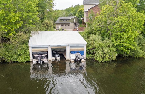 Ludington Condo | #2 Lakefront Hamlin Lake Retreat - Sleeps 10