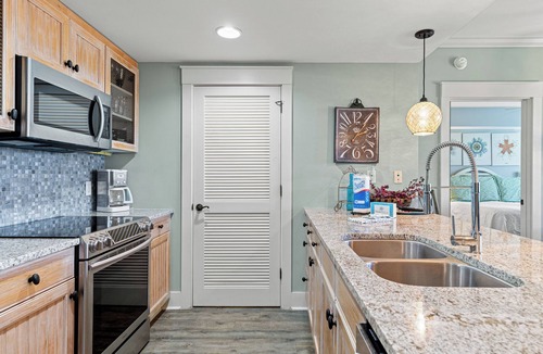 Baytowne Wharf Condo | 2BR Condo at Baytowne! Walk to Wharf, GOLF CART, Tropical Pool & Hot Tub.