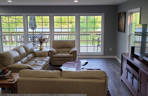 Delton House | 3 bedroom home on a peaceful private no wake lake. With kayaks and floating deck