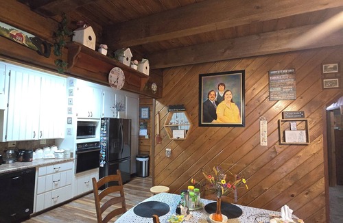 Pansey Cabin | 3-bedroom log cabin backs up to wooded lot for maximum peace and quiet!