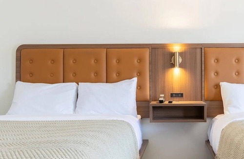 Talbot's Corner Hotel | 3 Charming Rooms in East Nashville near Ryman Auditorium | Pool & Free Parking