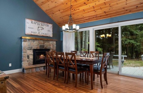 Rapid City Cabin | 4-bedroom Cabin on the Rapid River with WiFi, AC, Dock, Access to Chain of Lakes
