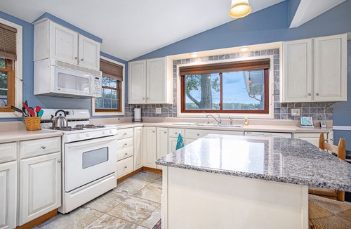 Plainwell House | 4 bedroom lakefront house on Pine Lake! Sunrise and Sunset views!