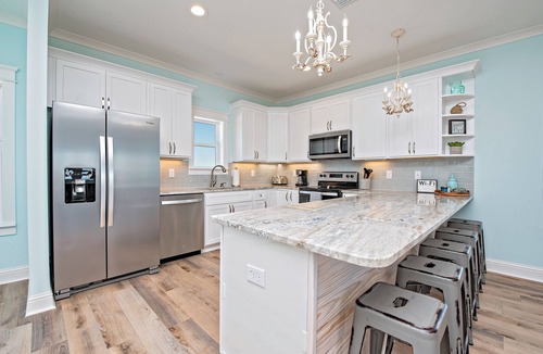 Southpointe House | A Wava Sunshine big 5-bedroom beach view home with pool steps to the beach by Prickett Properties