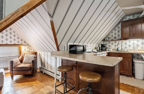 Marquette House | Apt 3 Hewitt Onion Tower attic walk up central Marquette, sauna fitness room