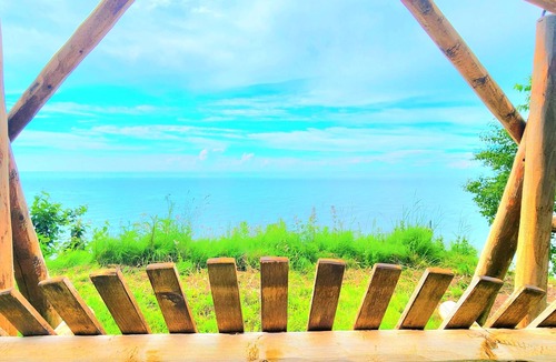 Laurium Cabin | Artistry view of Lake Superior in authentic cottage will have you refreshed