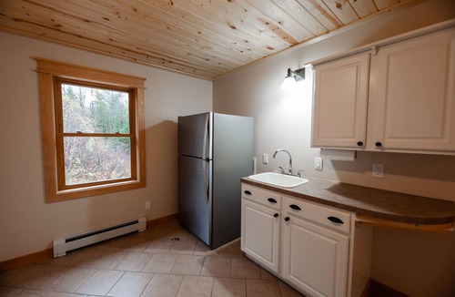 Champion House | ATV-Snowmobile Trail, Large home, sits on the peshekee river. sleeps 22 people.