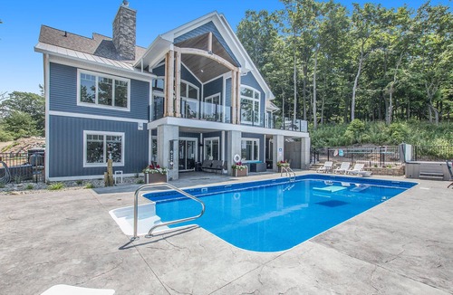 Ludington House | August 9th-16th, 2026 available! heated pool! Sleeps 20!