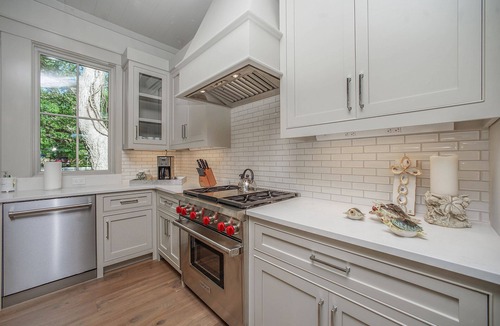 Grayton Beach House | Backyard Creek And Outdoor Kitchen- Jubilee Retreat By Royal Destinations