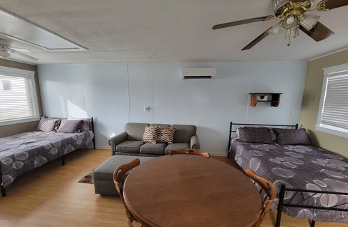 Lake Odessa Cottage | Beautiful open floor plan cottage with lake view