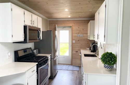 Onekama House | Beautiful updated home with 100’ on Portage Lake - 20 minutes to Arcadia Bluffs