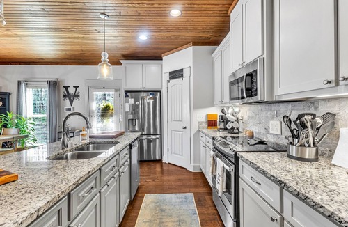Pleasure Point House | Bella's Cove, 4BR/3BA Retreat at Lake Martin - swimming cove - pets ok!