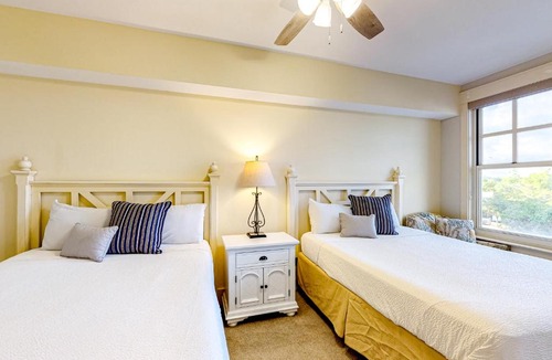 Baytowne Wharf Apartment | Bright & cozy coastal condo with shared pools hot tubs fast WiFi & central AC