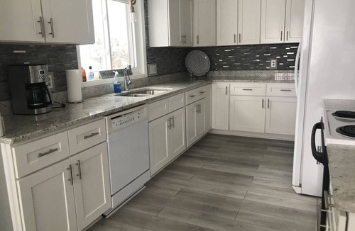 Rapid City House | Caribbean-Blue Elk Lake Escape Remodeled 6BR Waterfront Retreat.
