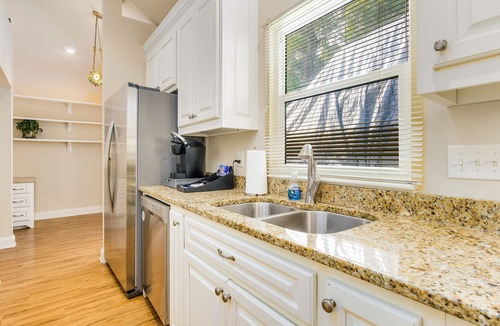 East Hill House | Cozy Carriage House with Pool, Bikes, and Charming Neighborhood
