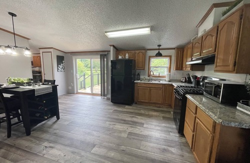 Northeast Michigan House | Cozy country home, “Sunny Meadows” in Cadillac on 40 Acres! Pet Friendly.