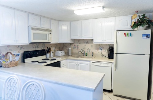 Sunnyside Condo | Cozy two bedroom, 2.5 bath, gulf-front tower unit on west end of beach