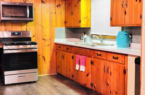 Carp Lake House | Cozy Waterfront 4-bedroom Cottage. Best Sunsets! 10 mins South of Mackinaw City!