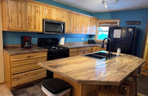 Munising Cabin | Crossover Cabin is ready for your outdoor adventure! Perfect for snowmobilers!