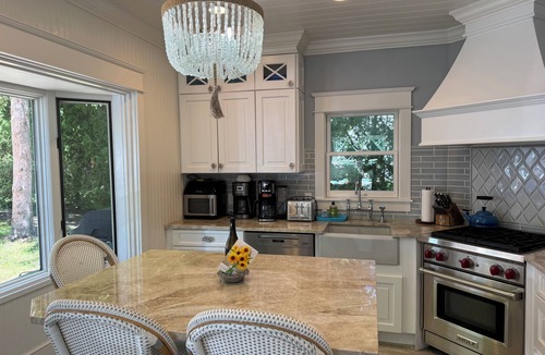 Harbor Springs House | Daybreak Cottage Walk to Beach, Town and Yacht Club sit on the Front Porch