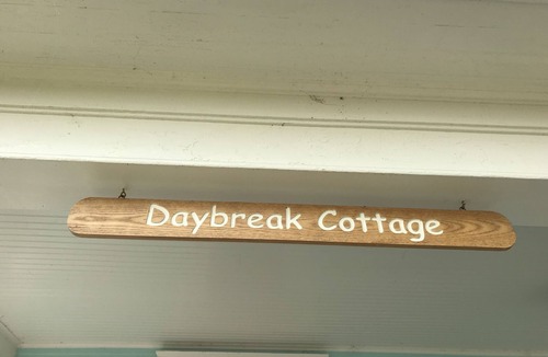 Harbor Springs House | Daybreak Cottage Walk to Beach, Town and Yacht Club sit on the Front Porch