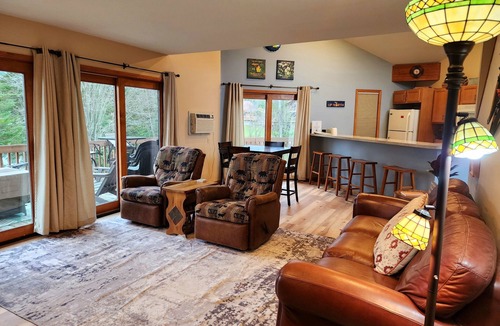 Mancelona Condo | Deck with views! 2 bed 2 bath sleeps 6-8, pool,close to Torch Lake, Boat parking